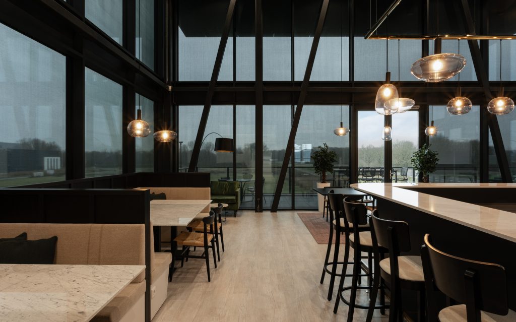 Minimalist Renson curtain wall screens prevent Netceed office from overheating 1 Renson