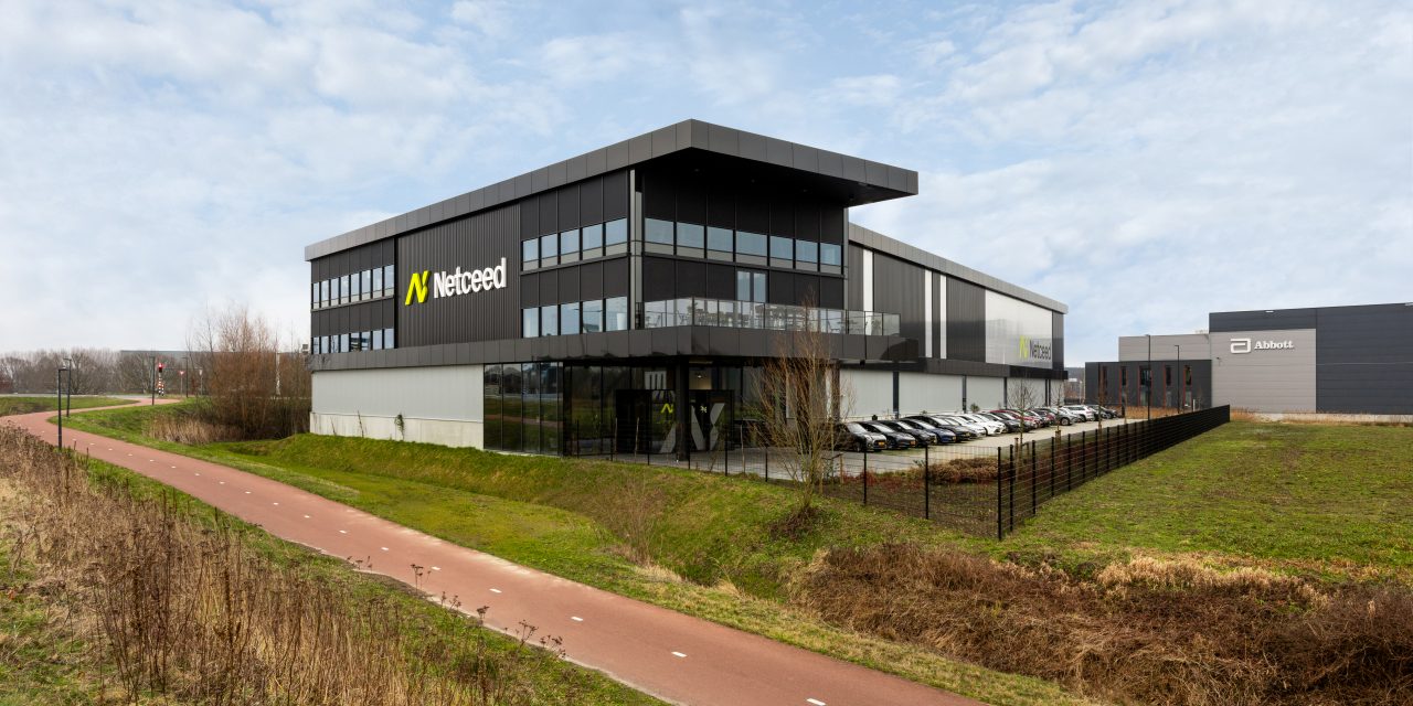 Minimalist Renson curtain wall screens prevent Netceed office from overheating