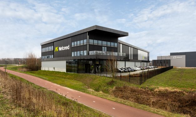 Minimalist Renson curtain wall screens prevent Netceed office from overheating